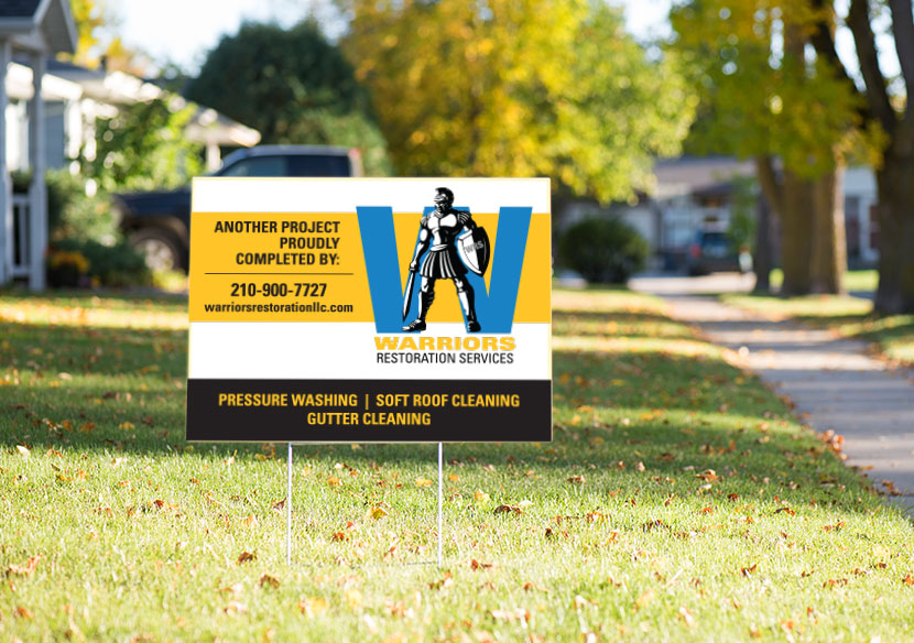 Warriors Restoration Services yard sign on sunny day